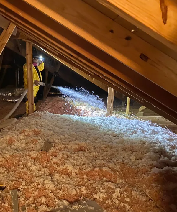 Professional attic insulation installation to improve home energy efficiency
