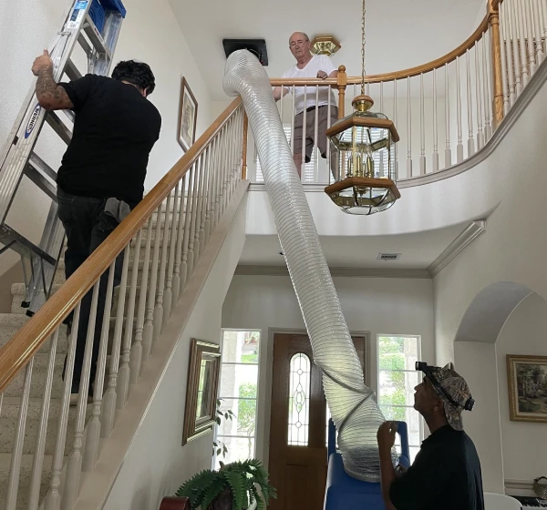 Our technician performing HVAC Cleaning in Austin